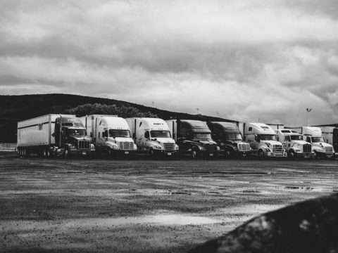 Photo by Kevin Bidwell: https://www.pexels.com/photo/parked-trucks-under-clouds-2348359/