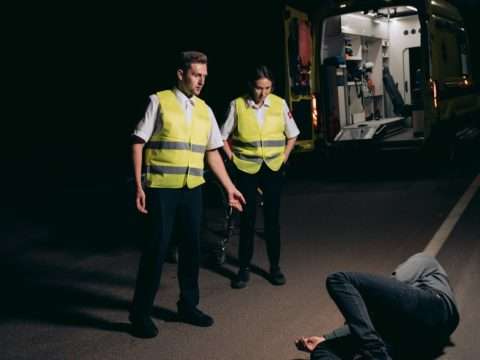 Photo by Mikhail Nilov: https://www.pexels.com/photo/paramedics-looking-at-the-person-lying-on-the-street-8942694/
